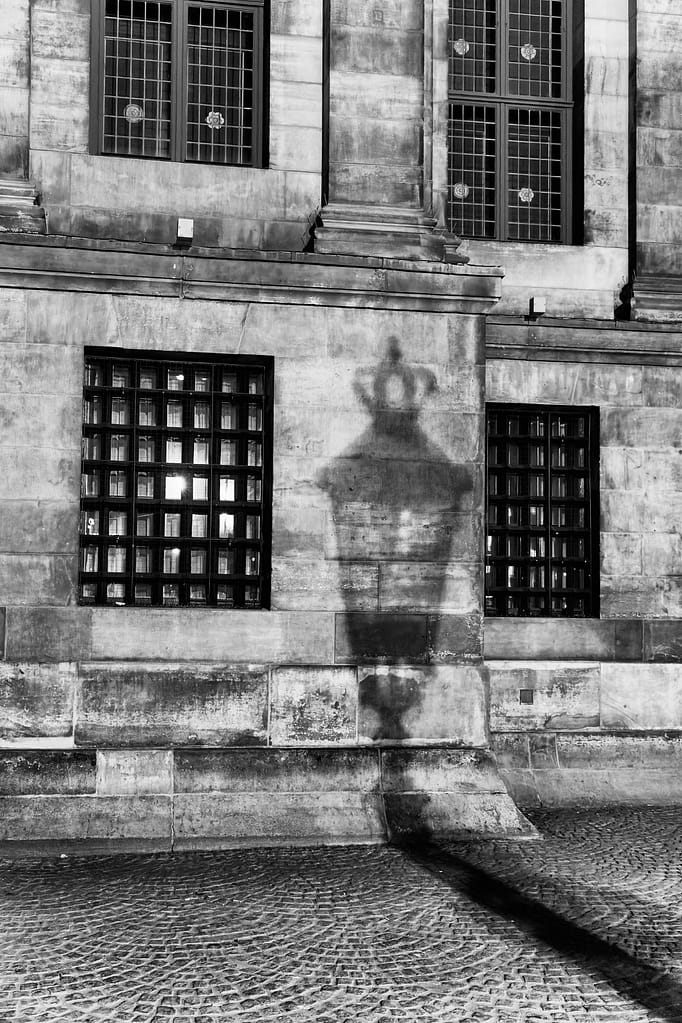 Dam Palace, 2022 A shadow cast by a lamp on the Dam Palace, 2022.