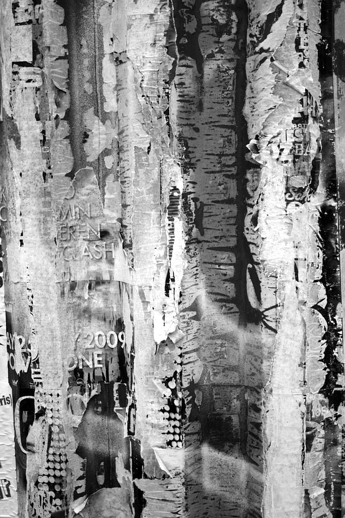 'Clash' 2010. Large format photo of weathered and torn posters in Amsterdam