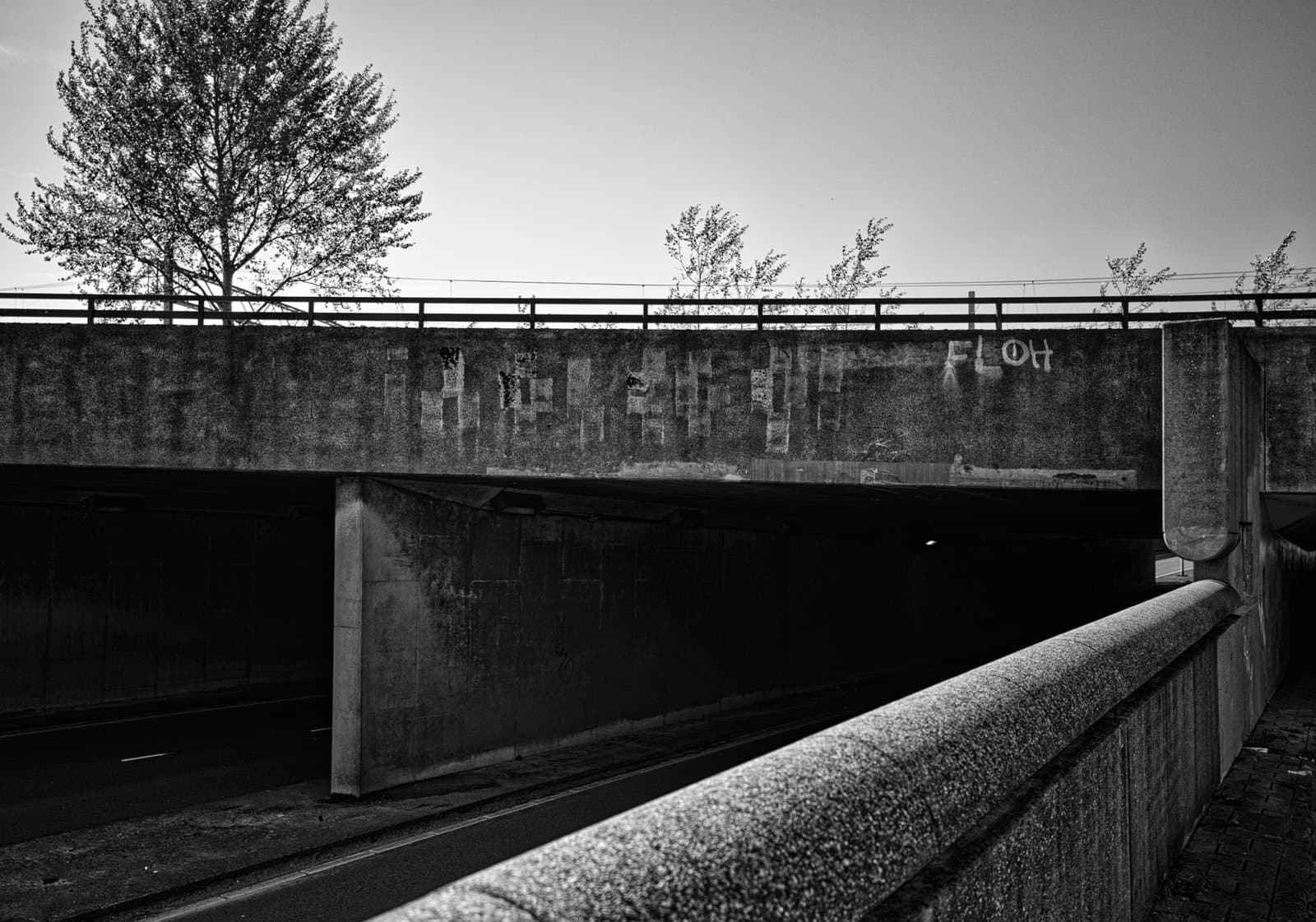 Marks left by posters on a viaduct in Amsterdam. 2023